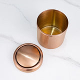 Eleganter Tischabfalleimer aus Edelstahl in Roségold mit Klappdeckel