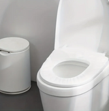 ReiseSauber Einweg-WC-Sitzauflagen aus Naturfasern für hygienischen Schutz unterwegs